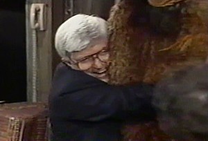 Picture from episode 2096 where Phil Donahue hugs Snuffleupagus